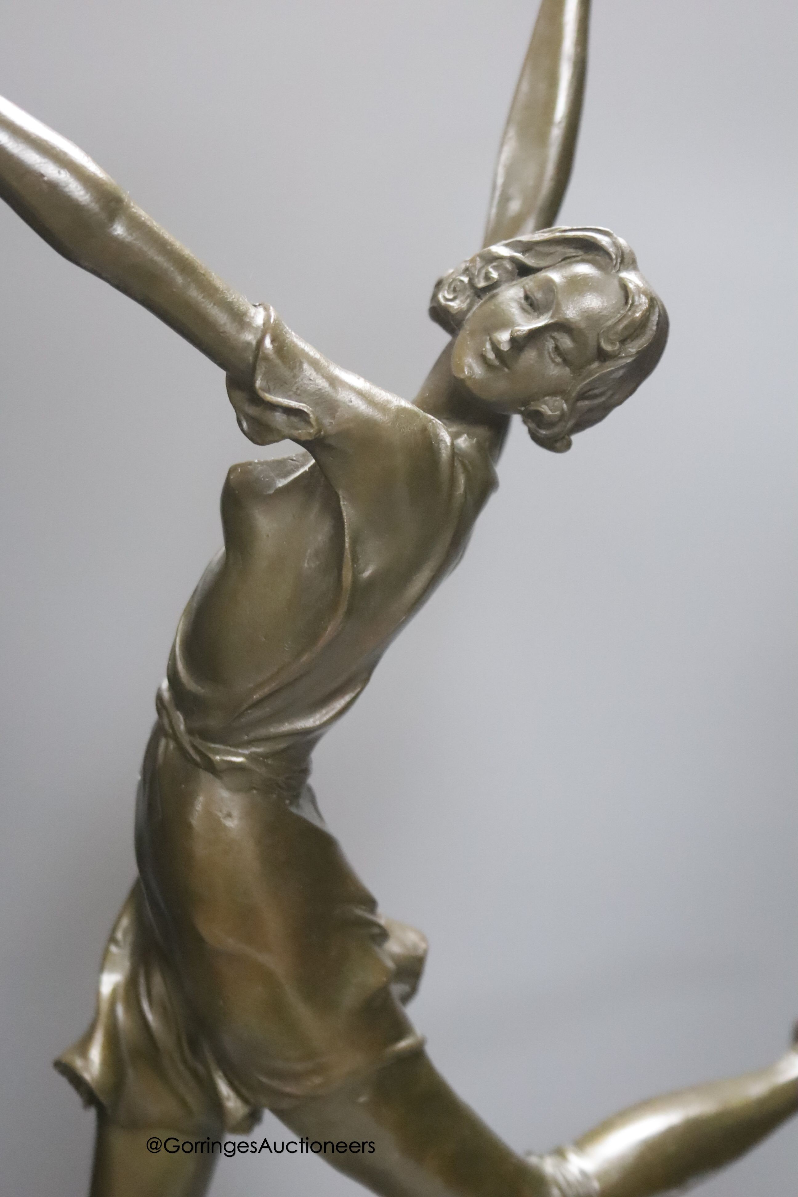 After B. Zach. An Art Deco style bronze figure modelled as a dancer, on a marble base, overall height 65cm